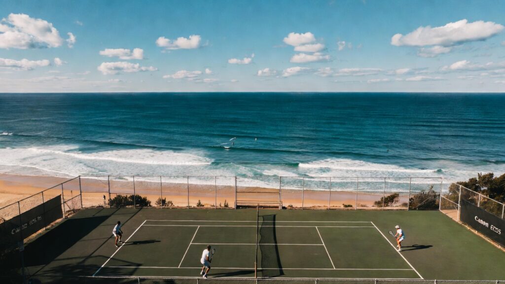 "Scenic clifftop tennis courts overlooking Bondi Beach near QT Bondi 5 star hotel Sydney."