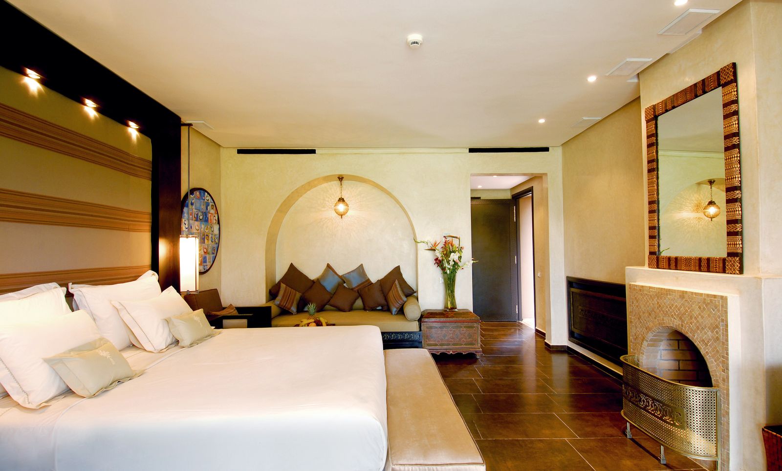 Elegant hotel suite with spacious bed and stylish decor