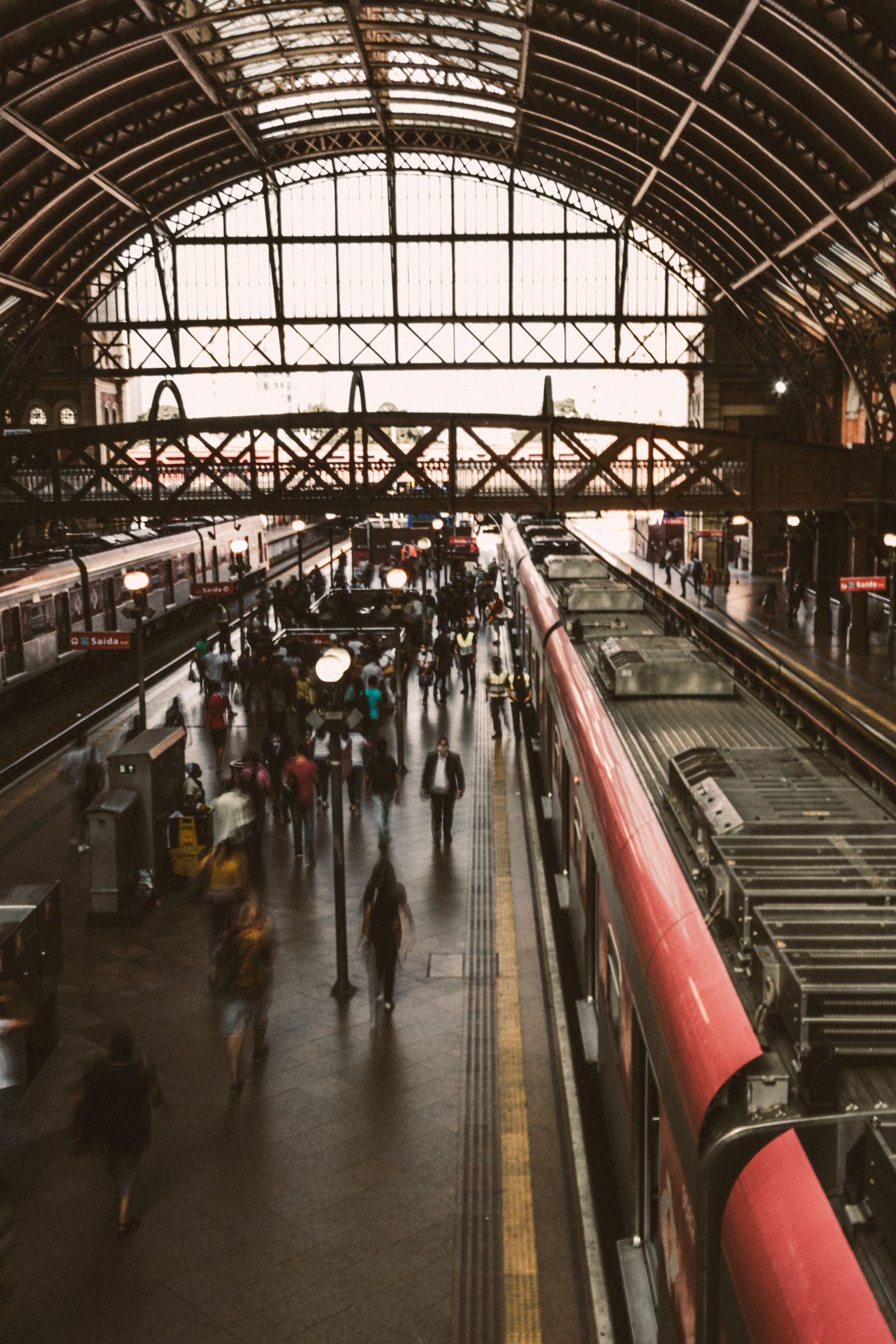Commuters waiting on a train platform, the start of a weekend getaway from Sydney by train